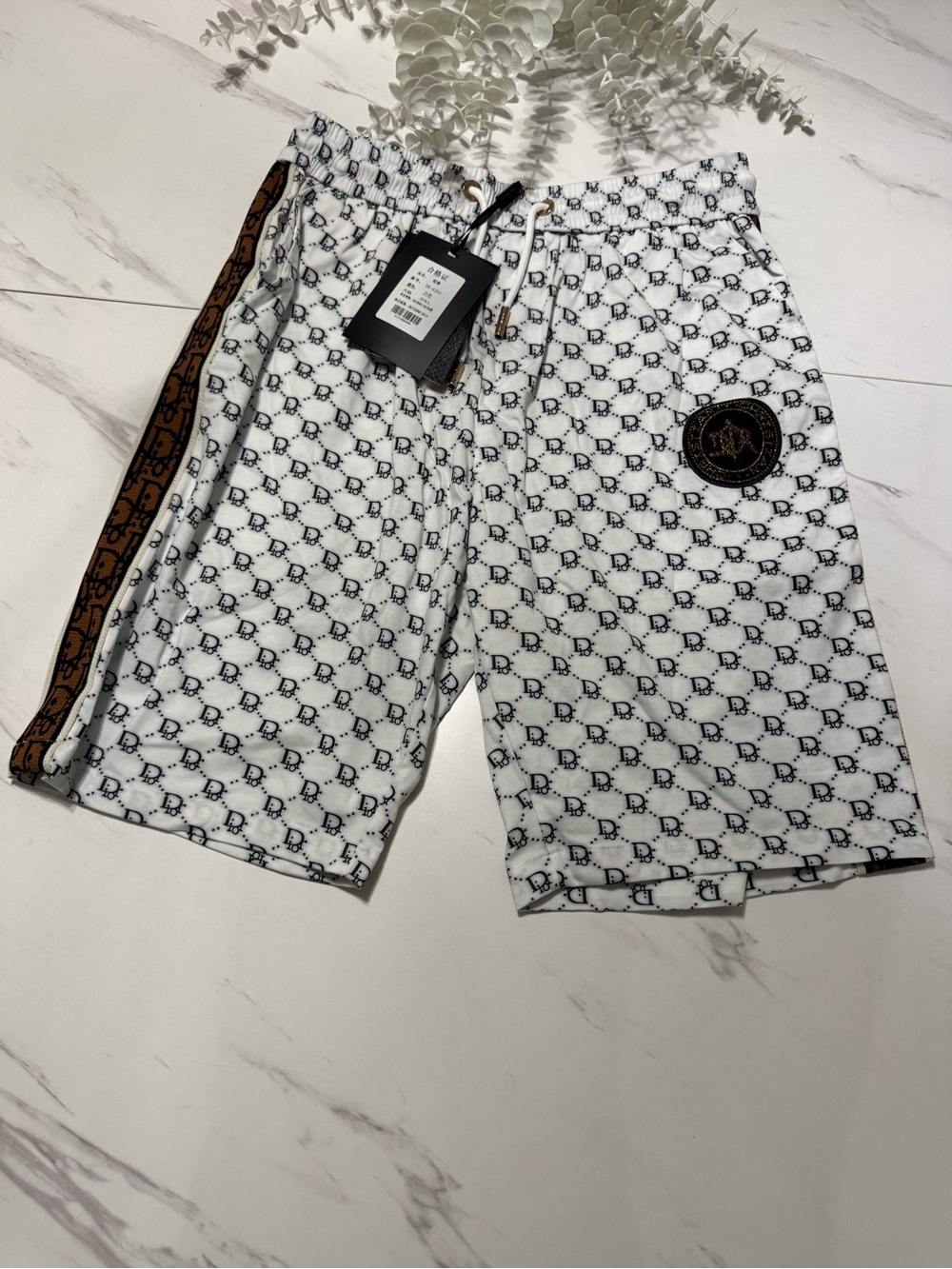 Men's White Patterned Swim Shorts with Brown Trim